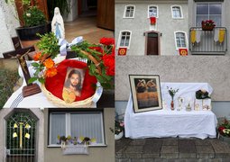zu Fronleichnam geschmückte Häuser und Fenster in Oggersheim